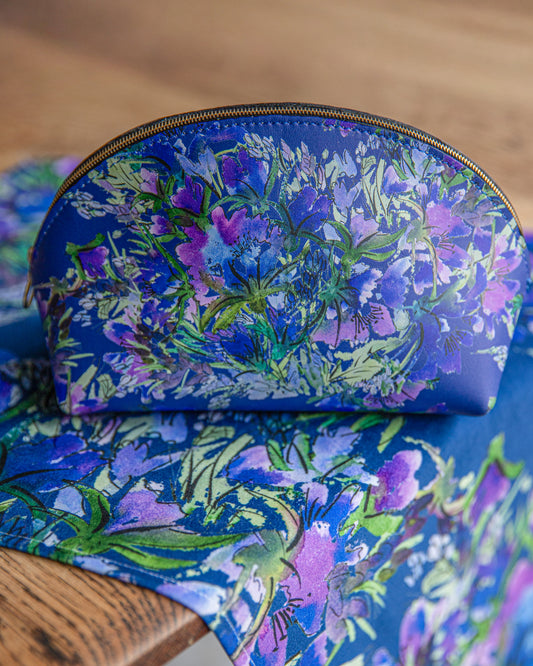 Floral wash bag and cosmetic bag , leather , waterproof linning,floral design from Mandy McKenna Designs